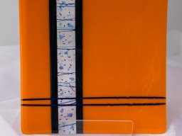 Orange glass plate from The Glassroom